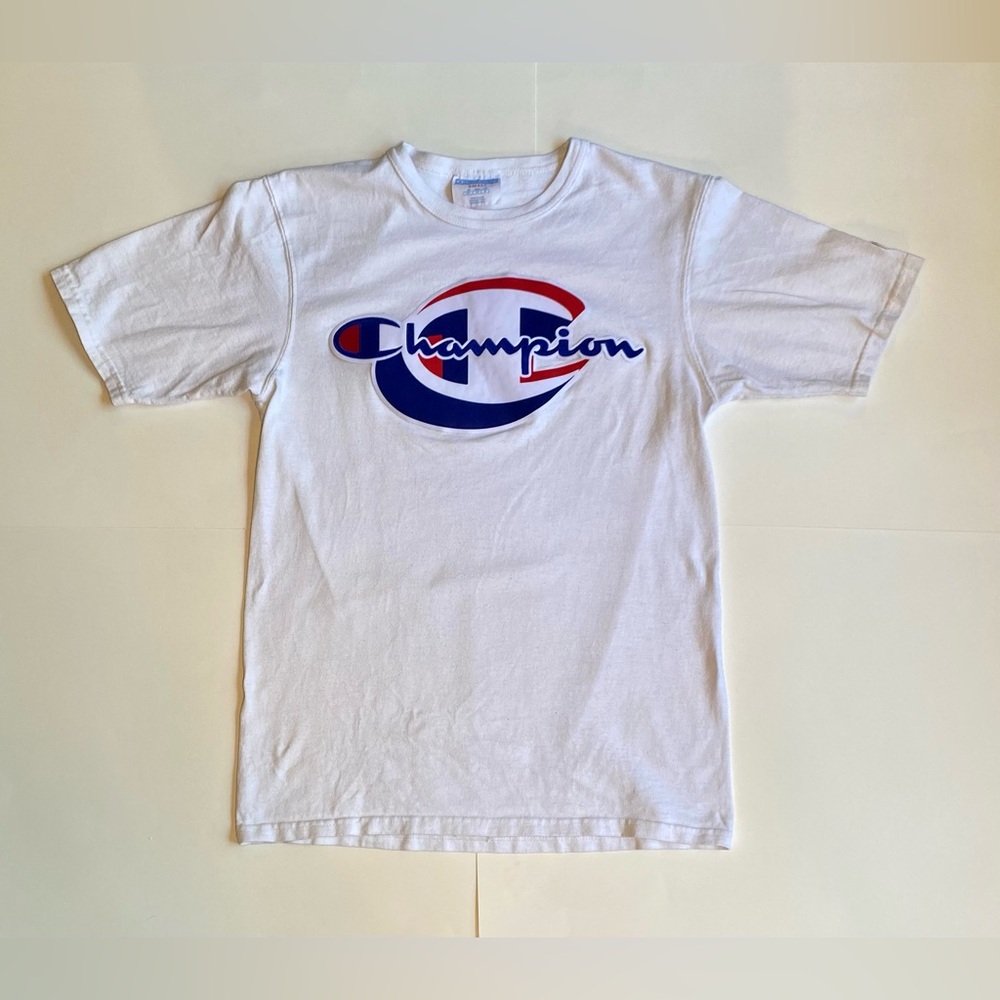 Men’s Champion tshirt. US size Small. Color white with logo on front chest.